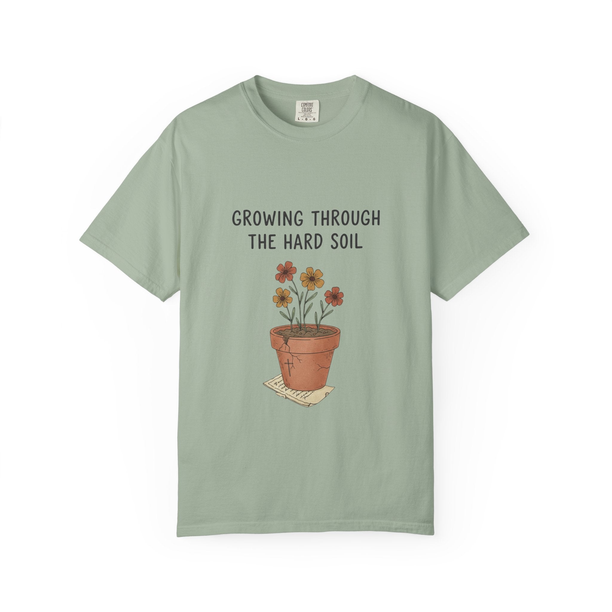 Grace in Progress Faith T-Shirt — Growing Through the Hard Soil — Vintage Terracotta Plant Christian Tee | Healing & Growth Design for Women