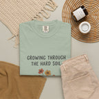 Grace in Progress Faith T-Shirt — Growing Through the Hard Soil — Vintage Terracotta Plant Christian Tee | Healing & Growth Design for Women